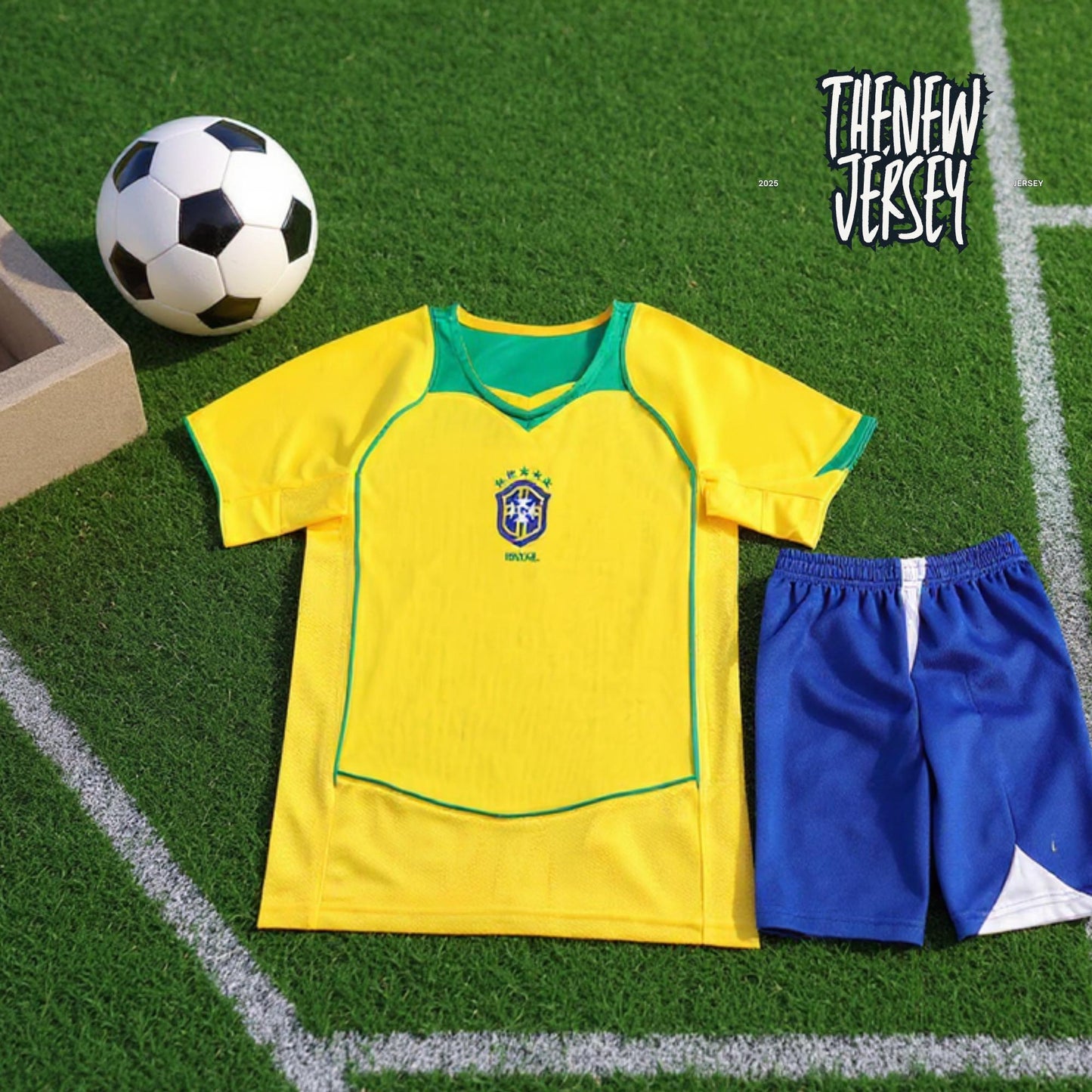 Kids football kit jersey and shorts Brazil style flat lay
